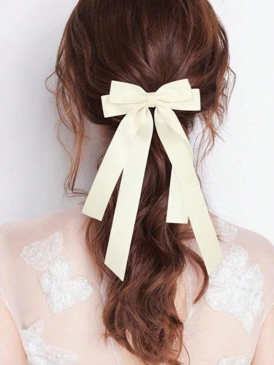 Satinschleife Haare, cremefarbene Haarschleife, elegantes Haaraccessoire, Schleife für Hochsteckfrisuren, Haarschmuck Hochzeit, luxuriöse Haarschleife