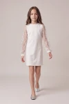Kleid Vivienne in Weiß für Mädchen – Tüllärmel mit Pailletten – Ganzkörperansicht in Bewegung